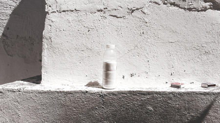 White Wall and Bottleの写真素材