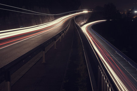 Vector simulation of night traffic long exposure. High definition editable vector.