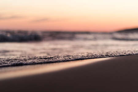 Sea ââcoast with horizon line on sunset time.の写真素材