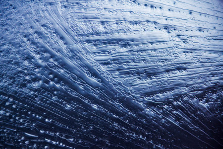 Ice texture background. All shades of blue and cold colors.