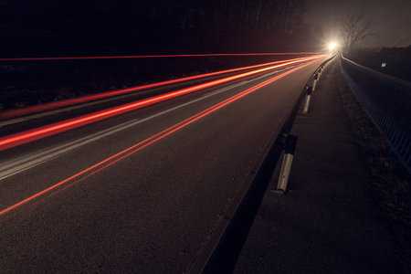 Vector simulation of night traffic long exposure. High definition editable vector.