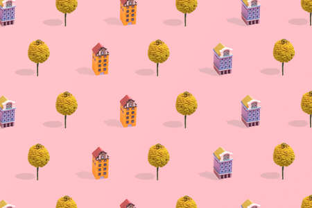 Pattern made of yellow and blue houses, and yellow flower. Cool, trendy, neighborhood idea.の写真素材