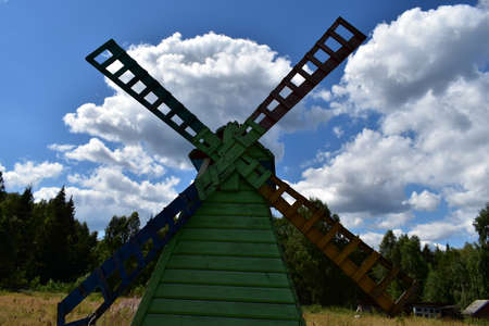 imitation of a mill on a background of cloudsの写真素材
