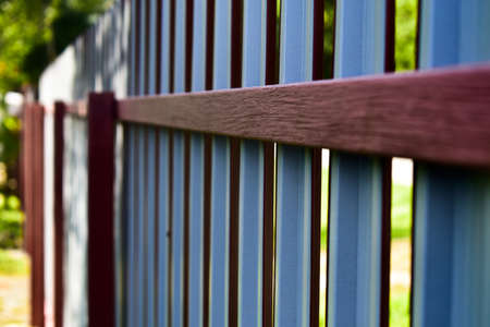 the back of a metal fenceの写真素材
