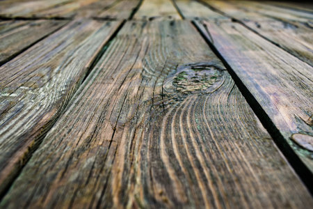 darkened old wood planks on the wall