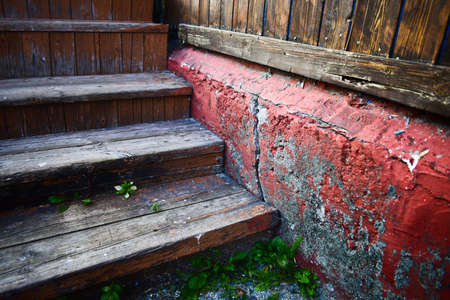 wooden steps near the wallの写真素材