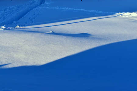 contrast photo of a snow fieldの写真素材