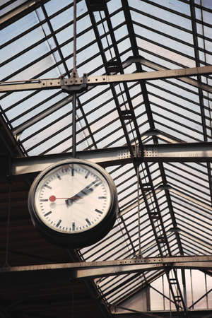 Old clock at a train station, Switzerlandの写真素材