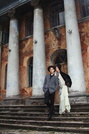 Retro styled fashion portrait of a young couple. Clothing and make-up in 1920s style.の写真素材