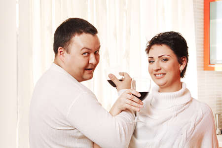 Family in home kitchen drinking wine. Brotherhoodの写真素材