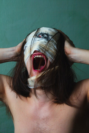 Horrible guy with scary mouth and one eye, schizophrenia