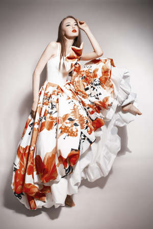 young beautiful asian brunette in gorgeous dress. dollの写真素材