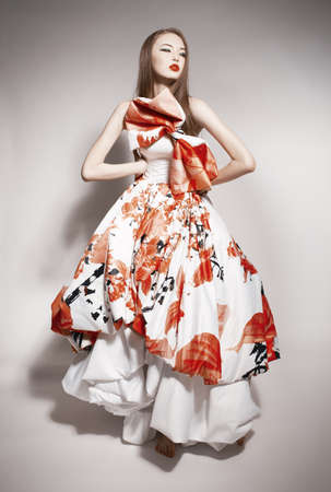 young beautiful asian brunette in gorgeous dress. dollの写真素材