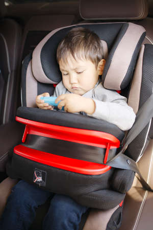 Luxury baby car seat for safety with happy kidsの写真素材