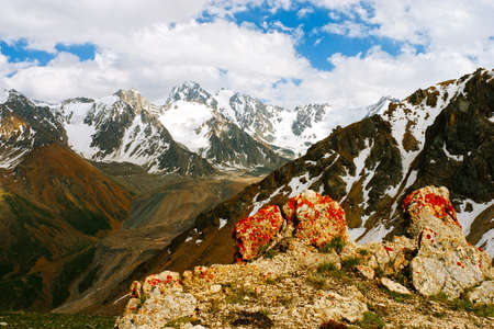 Beautiful Tien shan peaks and mountains near Almaty. Dramatic overcast sky. Beauty world.の写真素材
