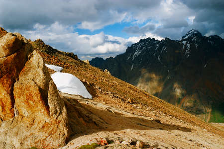 High peak with snow and sharp rocksの写真素材