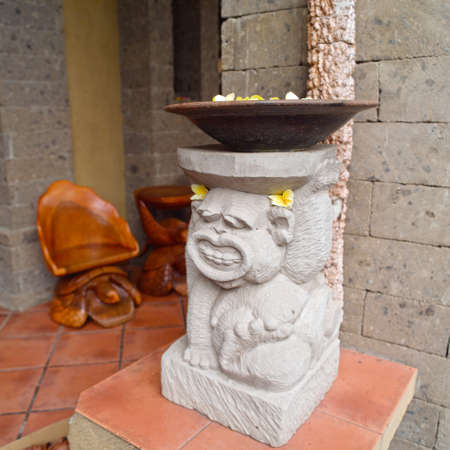 BALI, INDONESIA - August 16, 2017: Wood carving in Bali Indonesia. Often decorates gardensのeditorial素材