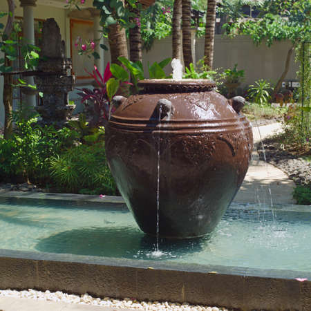 Fountain in backyard, gardening designの写真素材