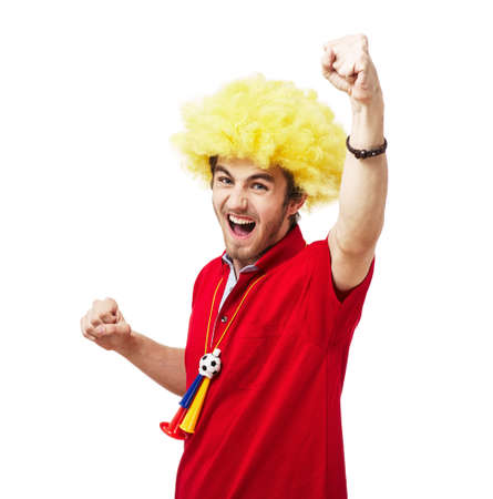 Football or soccer fan screaming with supporter attributes isolated on whiteの写真素材