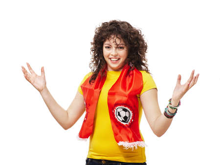 Football or soccer woman fan screaming with supporter attributes isolated on whiteの写真素材