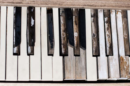 The keys of a piano left to the weather and sun in the Nevada desertの写真素材