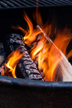 A campfire burns in a fire ringの写真素材