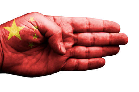 A hand embellished with the flag of China on whiteの写真素材