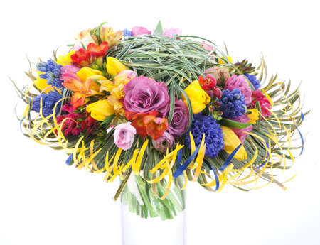 Floristics - colorful bridal bouquet of flowers isolated over white background. Wedding styleの写真素材