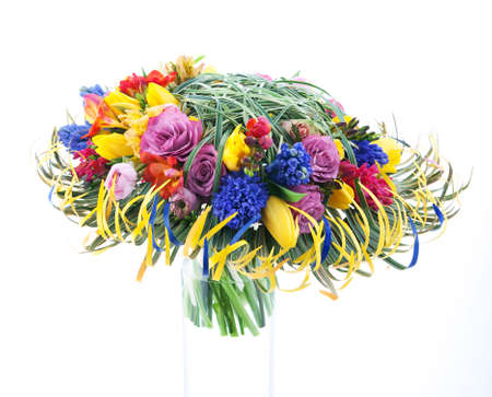 Colorful festive bouquet of flowers isolated on white backgroundの写真素材