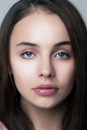 Beautiful face of beauty woman with perfect eyes and lips  Natural makeupの写真素材
