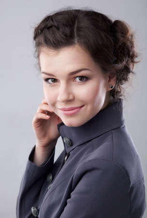 Closeup portrait of a happy young female - businesswomanの写真素材