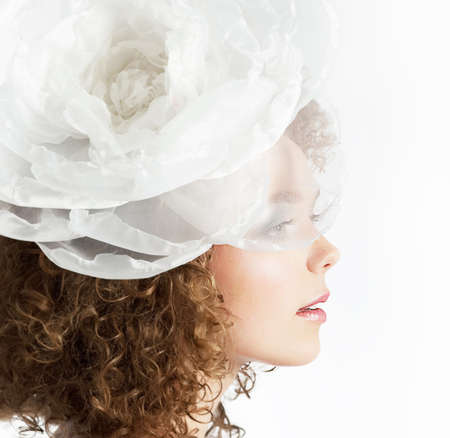 Happy beautiful curly red hair bride on white background close upの写真素材