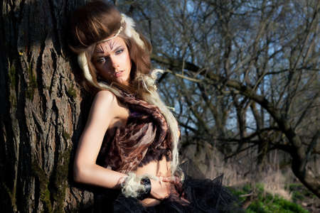 Portrait of romantic woman in fairy forest  Renaissance style  Nature scenic  Masqueradeの写真素材