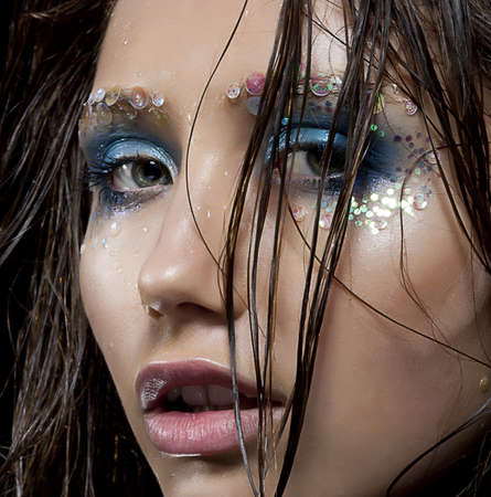 Close-up beautiful woman with bright stylish make-up  Style and creativityの写真素材