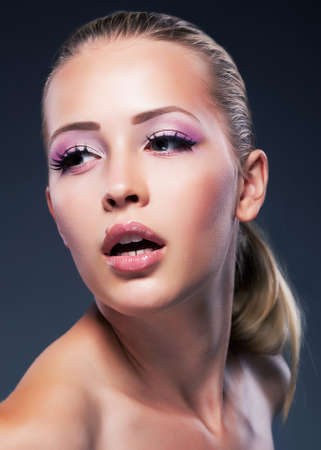 Natural health beauty of a woman face, toothy smiling fashion modelの写真素材