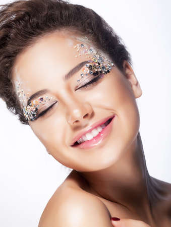 Elated young woman smiling with closed eyes - pleasure and bliss  Sensuality and charming の写真素材