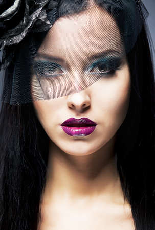 Close-up female widow with black mourning veilの写真素材
