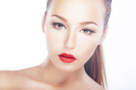 Pure beauty. Luxurious woman face - red lips, natural clean healthy skinの写真素材