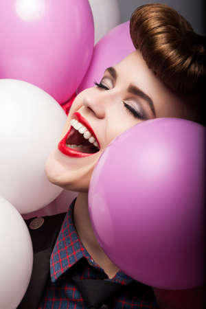 Joy - Happy Laughing woman with Colorful Air Balloons - Salesの写真素材