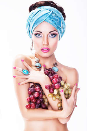 Girl with Winegrapes  over White backgroundの写真素材