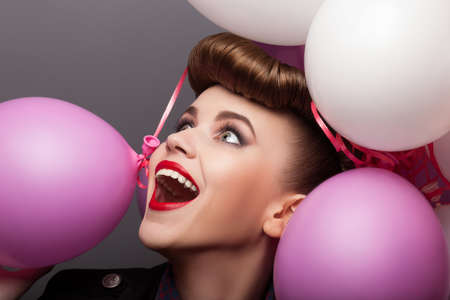 Happy Woamn with Air Balloons Having Fun - Expressionの写真素材