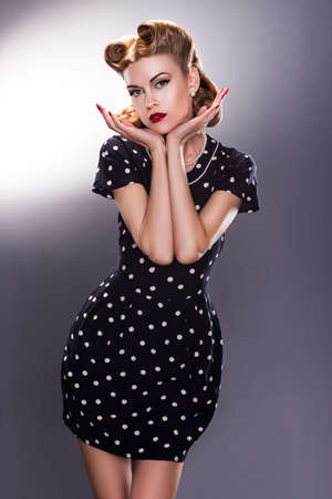Styled Young Female in Blue Polka Dot Dress - Vintage fashion Styleの写真素材