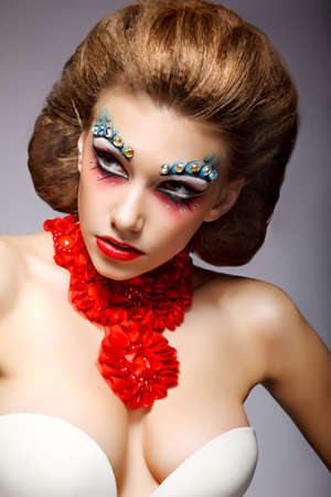 Theatre. Classy Woman with Fantastic Stagy Colorful Makeup. Fantasyの写真素材