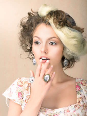 Astonishment  Portrait of Surprised Woman in Retro Dress  Dazeの写真素材