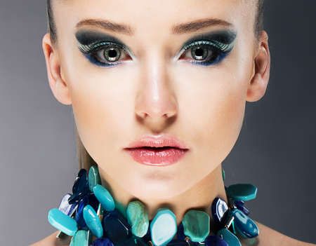 Glamorous Confident Woman in Semi Precious Turquoise Necklace close upの写真素材