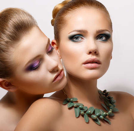Bonding  Allure  Faces of Two Sensual Pretty Women Closeup  Aspirationの写真素材
