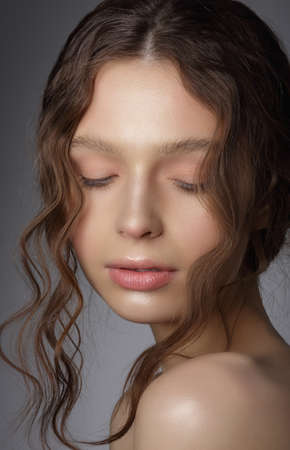 Dreamy Girl with Closed Eyes in Thoughts. Natural Clean Skinの写真素材