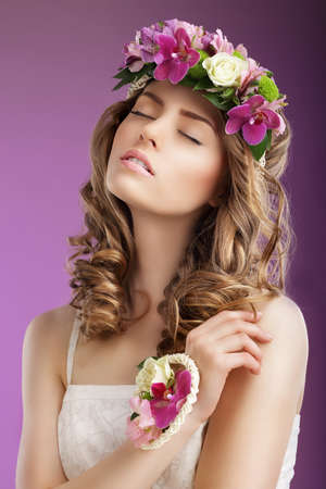 Sentiment. Imaginative Woman with Bouquet of Flowers Dreaming. Femininityの写真素材