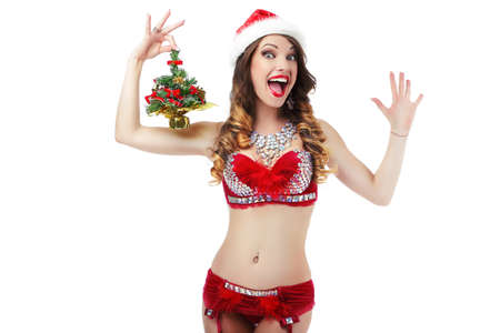 Ridiculous Lively Jolly Snow Maiden with Christmas Tree as a Giftの写真素材