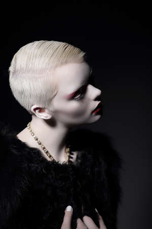 Individuality. Glamorous Well-dressed Blond Woman with Short Haircutの写真素材